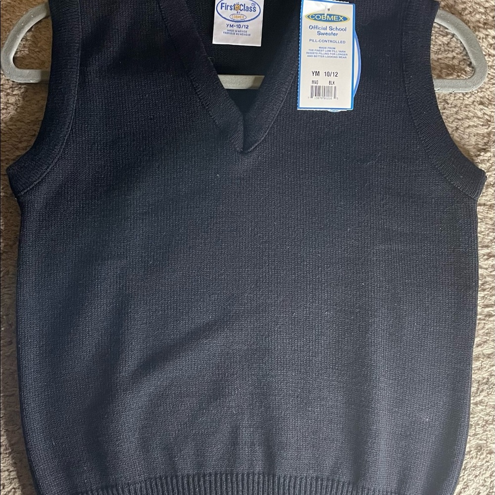 Black uniform V neck sweater size medium youth.